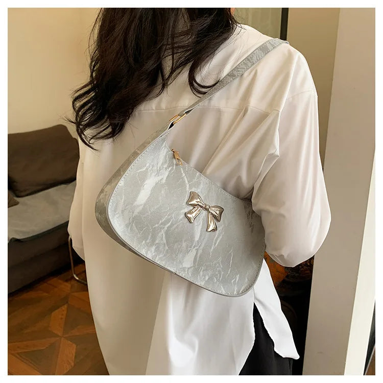 Amélisse Schultertasche – Elegante Schleife