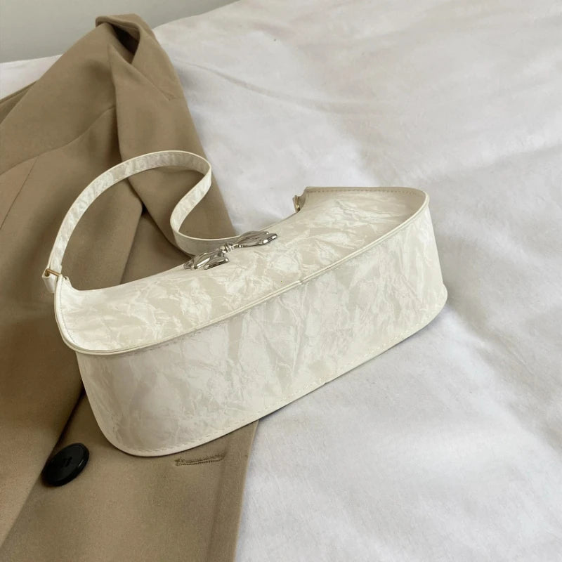 Amélisse Schultertasche – Elegante Schleife